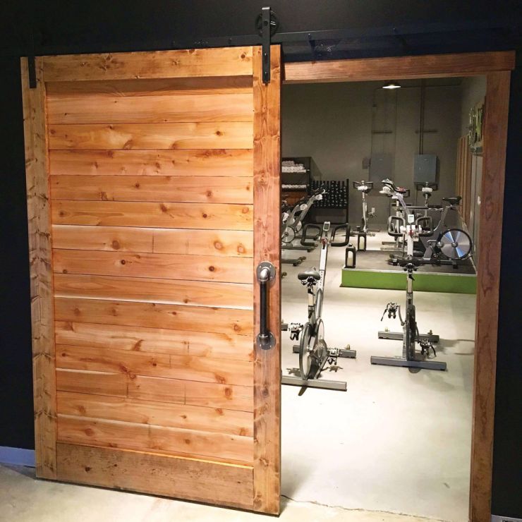 barn door opening on gym